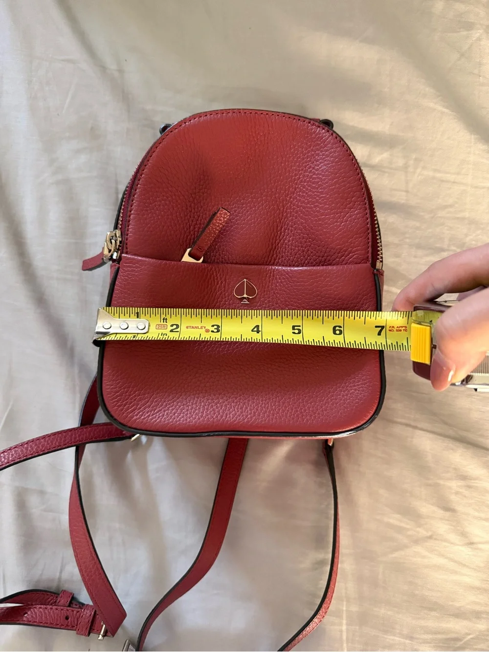 kate spade pebble leather red mini backpack